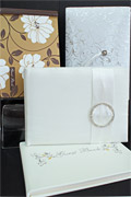 List Cracker paper products within the “Guestbooks / Planners” sub-category